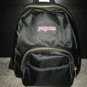 Black Jansport MINI backpack